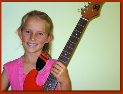 child with guitar